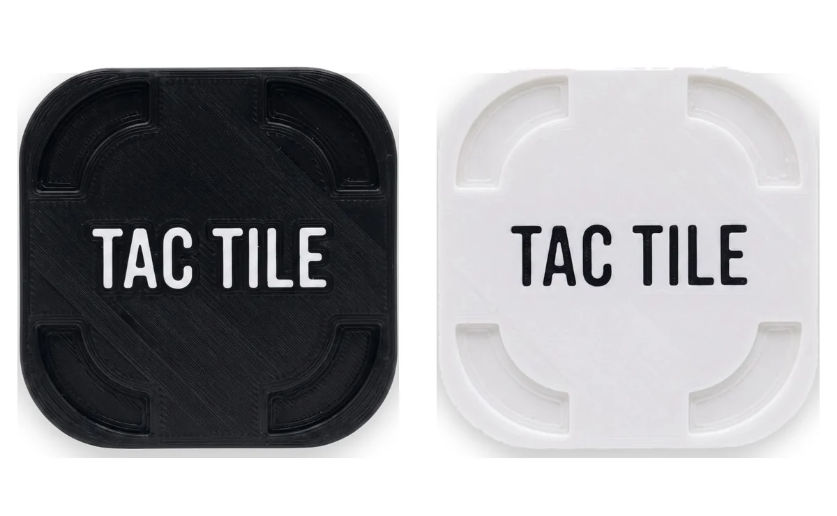 A Blackout and a Whiteout TAC TILE side by side