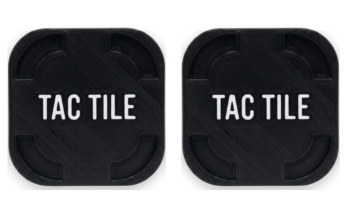 Two Blackout TAC TILE tiles side by side