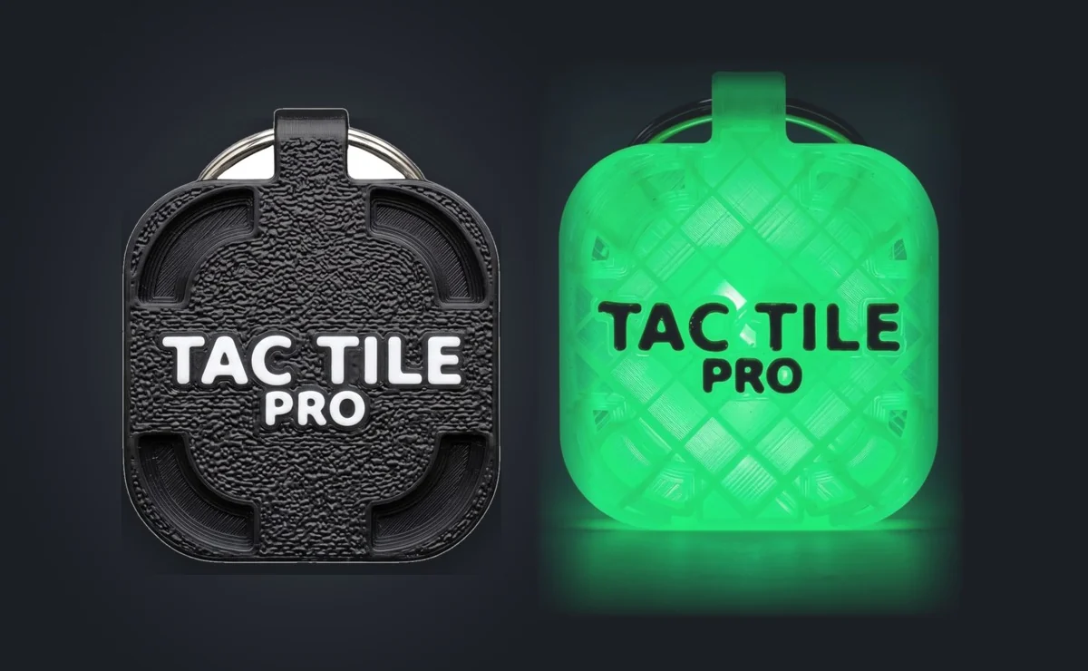 A Blackout Pro tile beside an Aurora Pro tile glowing green